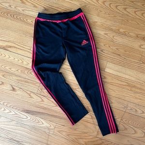 Adidas track pants.